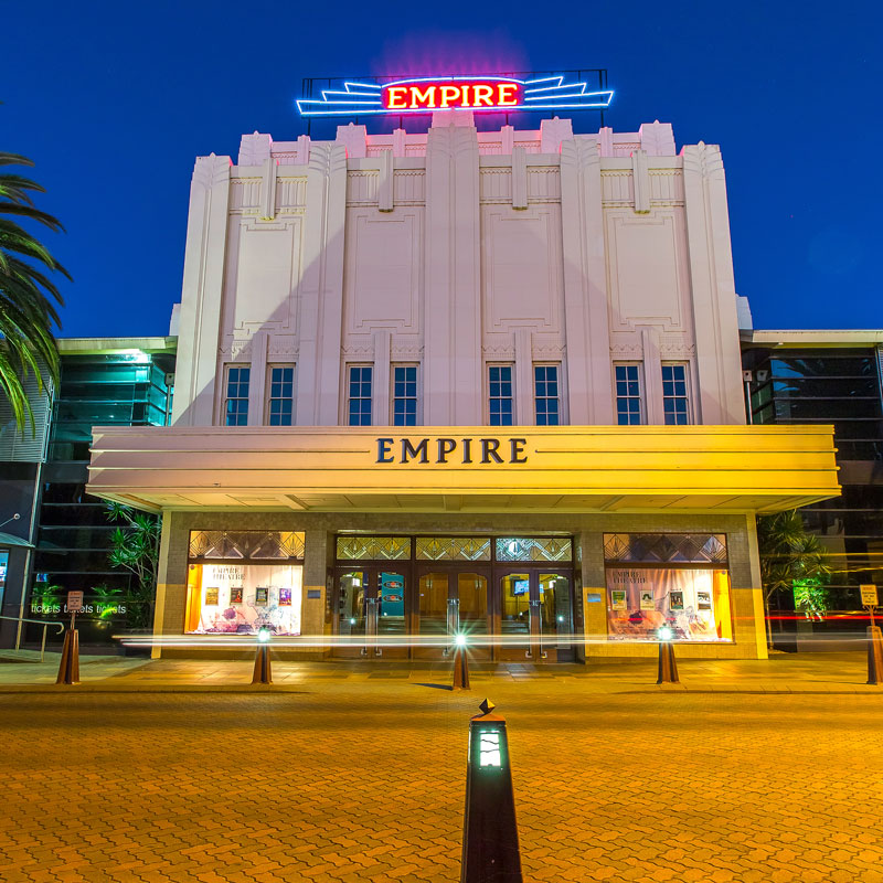 Empire Theatre at night with lights on