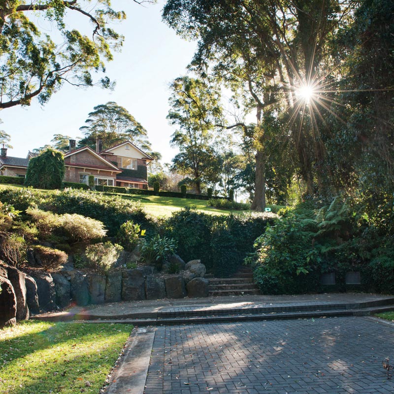 Boyce Estate on top of green grassy hill